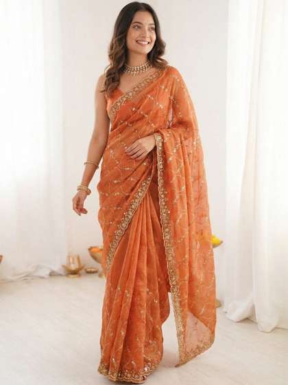 Kalista Ethnic
                        Motifs Zari Poly Chiffon Designer Saree
