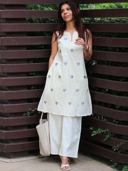 Aaghnya Women
                          Printed Regular Kurta with Palazzos