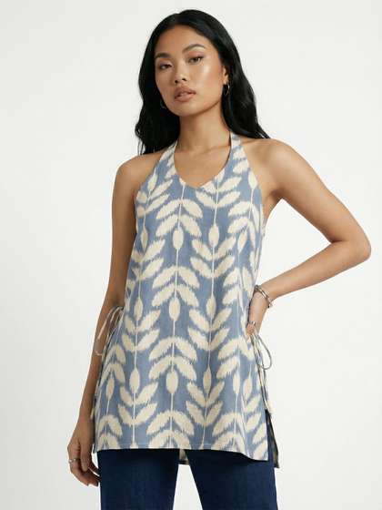 fusion by glitchez
                        Tropical Printed Halter Neck Styled Back Kurti
                        With Tie-Ups