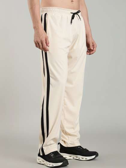 SWADESI STUFF Men
                        Striped Mid-Rise Regular Track Pants