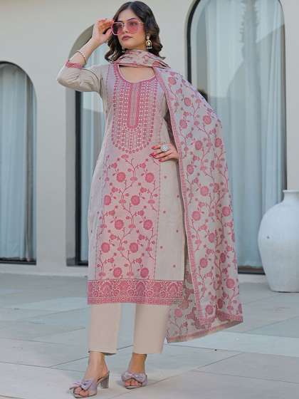 SKYLEE Women Floral
                        Printed Regular Thread Work Kurta with Trousers
                        & With Dupatta