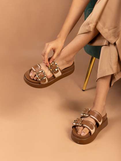CAI Gold buckle
                        strap tan platform