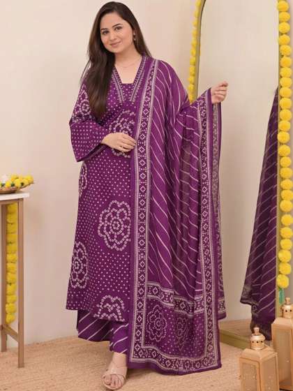 Keitra Women
                          Ethnic Motifs Printed Regular Kurta with
                          Trousers & With Dupatta