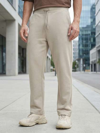 XYXX Men Solid
                        Mid-Rise Track Pant