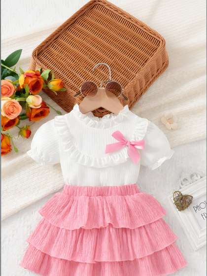 Jhilik Garments Girls
                    Top with Skirt