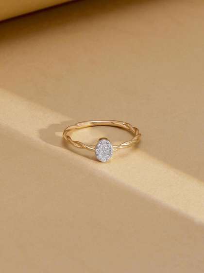 Mia by Tanishq 9 KT
                        Gold With 0.11 Carat Natural Diamond Ring
                        Diamond -1.06 g