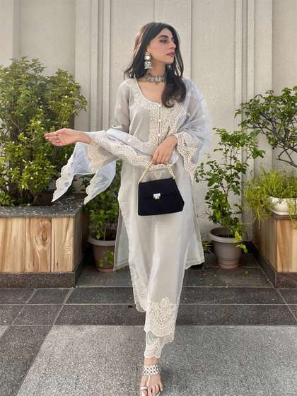 Royal Export Women
                        Floral Embroidered Regular Kurta with Trousers
                        & With Dupatta