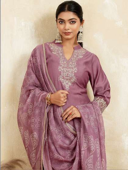 Anouk Women Ethnic
                          Motifs Embroidered Regular Thread Work Kurta
                          with Trousers & With Dupatta