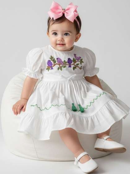 Sangria Girls Birds
                      Embroidered Cotton Puff Sleeves & Tassels
                      Dress