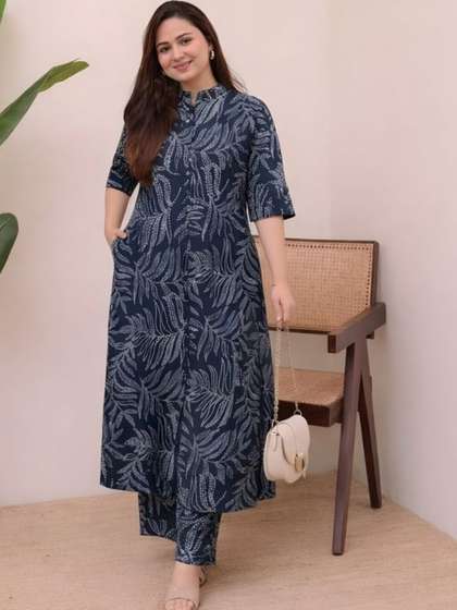 Klere Women Floral
                        Printed Regular Pure Cotton Kurta with Trousers