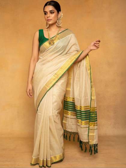 HARADHI Striped Zari
                        Tussel Tissue Kerala Sarees
