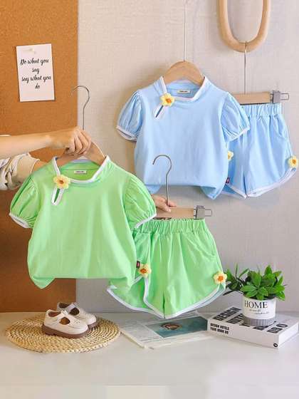 INCLUD Girls Pack Of 2
                    Round Neck Tshirt & Shorts
