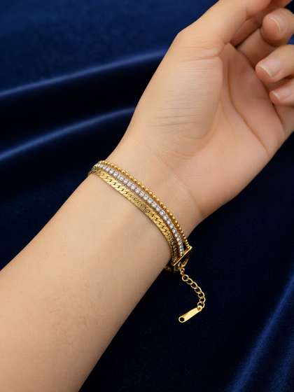 ARTKLIM Gold-Plated
                        Artificial Stones Studded Anti-Tarnish
                        Multistrand Bracelet