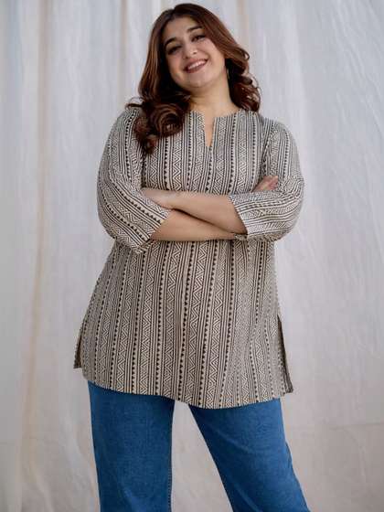 NG NIROMIKA Floral
                          Printed Boat Neck Kurti