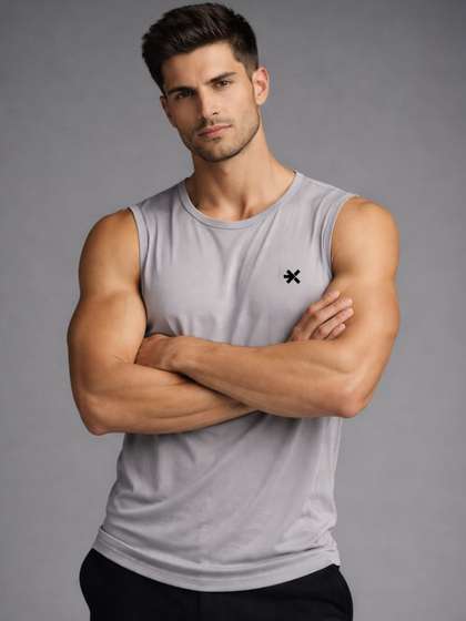 HRX by Hrithik
                        Roshan Men Solid Sleeveless Gym Vest Innerwear
                        Vests