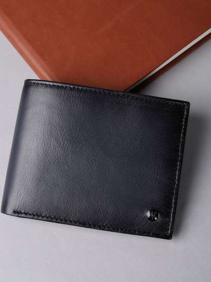 Van Heusen Men Textured
                    Leather Wallets