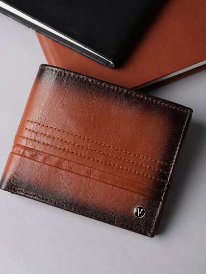 Van Heusen Men Textured
                    Leather Wallets