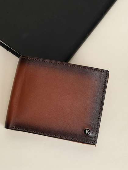 Van Heusen Men Textured
                    Leather Wallets