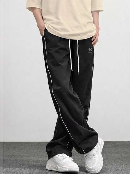 HRX by Hrithik
                          Roshan Men Regular Fit Training Track Pants