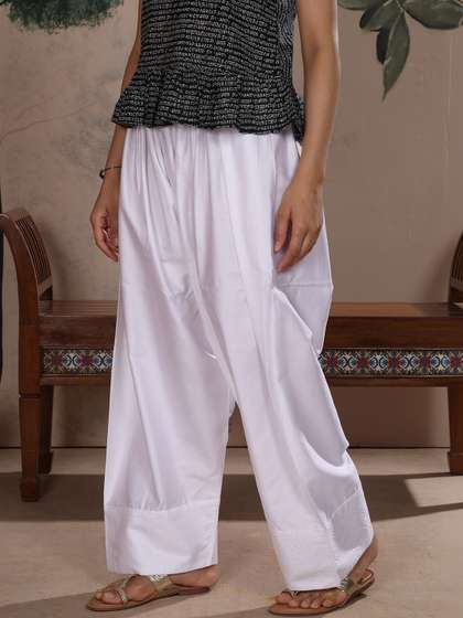 Saffron Threads
                        Women Embroidered Loose Fit Cotton Salwar