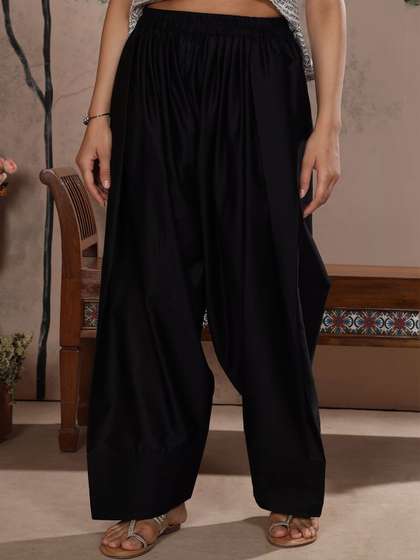 Saffron Threads
                        Women Embroidered Loose Fit Cotton Salwar