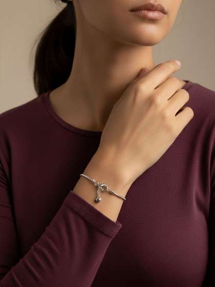 Anouk Women German
                        Silver Handcrafted Silver-Plated Charm Bracelet