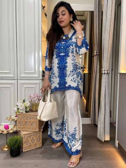 Aaghnya Women
                        Printed Regular Kurta with Palazzos