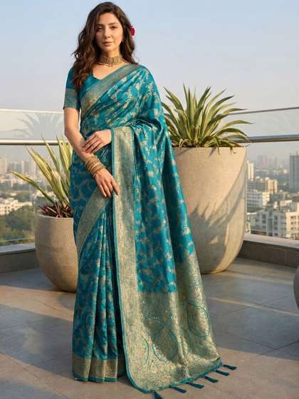 SHADOW & SAINING
                        Women Teal Blue Banarasi Jacquard Golden Zari
                        Weaving Sarees
