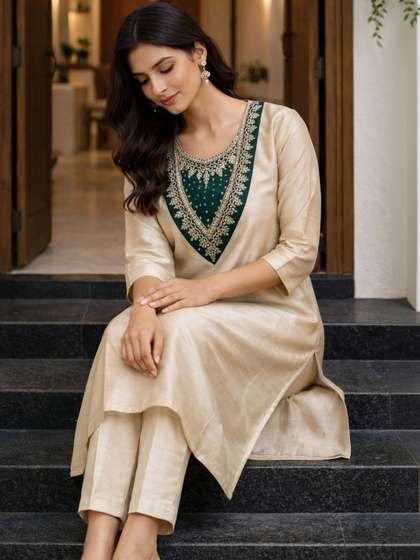 SDK FASHION Women
                        Ethnic Motifs Embroidered Regular Thread Work
                        Kurta with Trousers