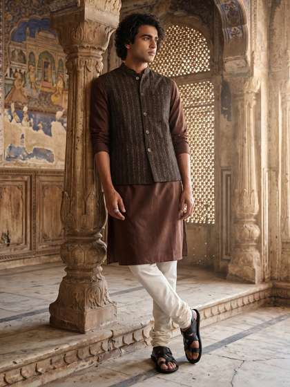 Taavi Ethnic
                          Motifs Printed Mandarin Collar Gold Khari
                          Nehru Jackets