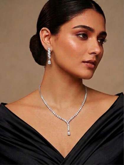 Niscka
                        Rhodium-Plated American Diamond Necklace and
                        Earrings