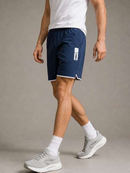 HRX by Hrithik
                        Roshan Men Running Sports Shorts