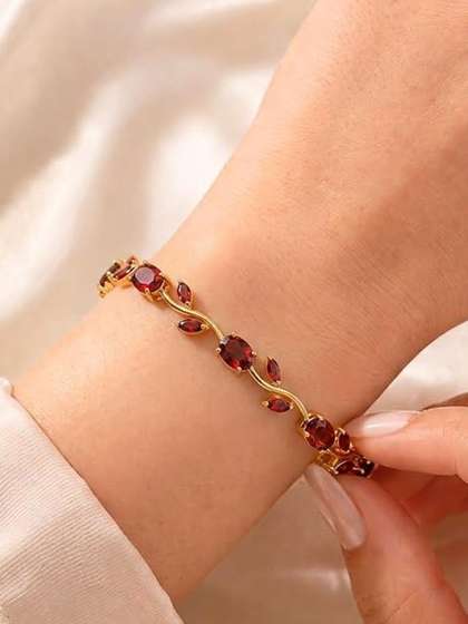 Airtick Women
                          Stainless Steel Gold-Plated Cubic Zirconia
                          Studded Bangle-Style Bracelet