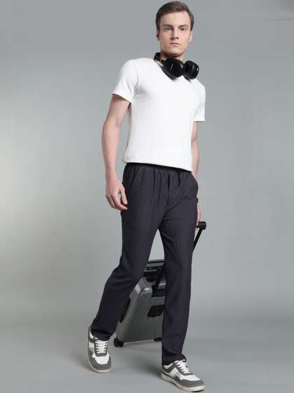 SZN Men Regular Fit
                        Self Design Track Pants