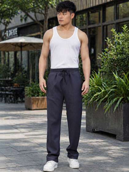 SZN Men Regular Fit
                        Self Design Track Pants