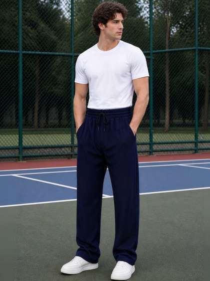 SZN Men Regular Fit
                        Self Design Track Pants