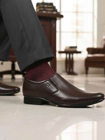 ALSTOM Men
                            Textured PU Loafers