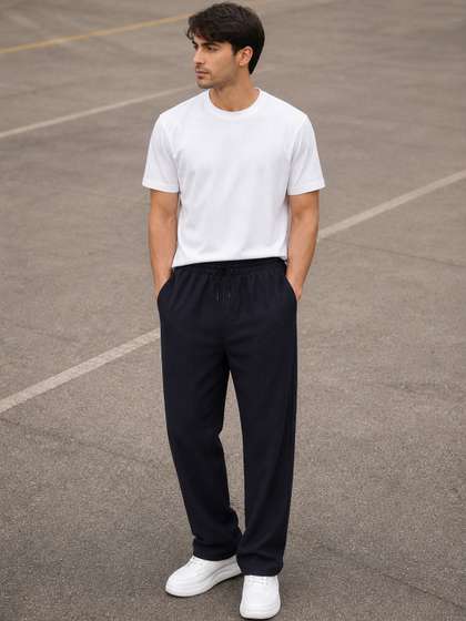 SZN Men Regular Fit
                        Self Design Track Pants