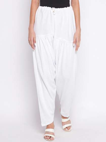 Clora Creation Women
                        White Solid Wool Loose-Fit Salwar