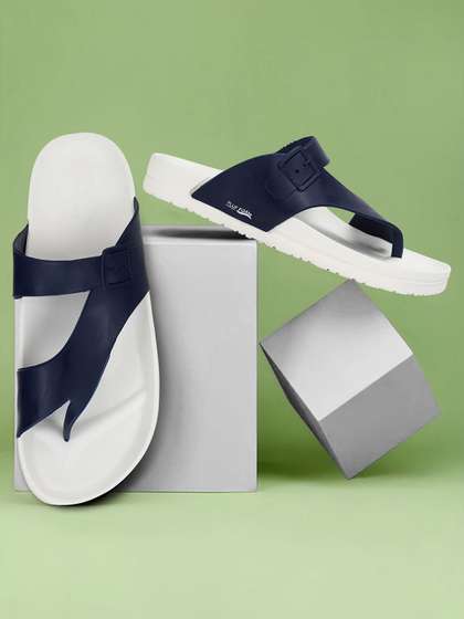 Paragon Men White &
                    Blue Solid Comfort Sandals