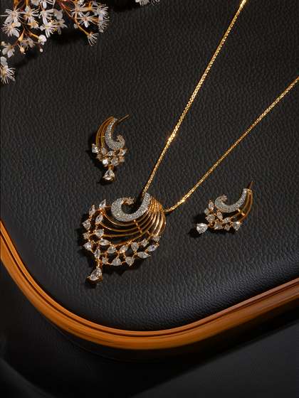 Saraf RS Jewellery
                          Gold-Plated White AD Studded Jewellery Set