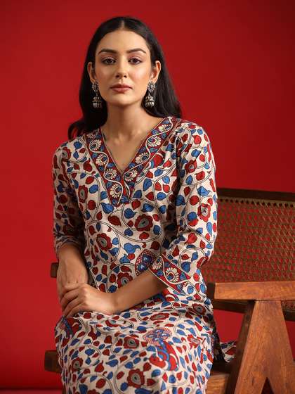 anayna Women Beige
                          Floral Printed Pure Cotton Kurta with
                          Trousers