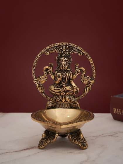 DecorTwist Gold-Toned Laxmi Brass Pooja Decorative Showpiece Diya