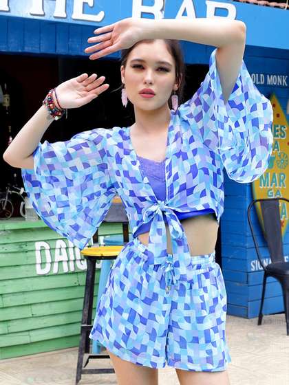 Sera Blue
                          Geometric Printed Crop Tie-Up Shrug