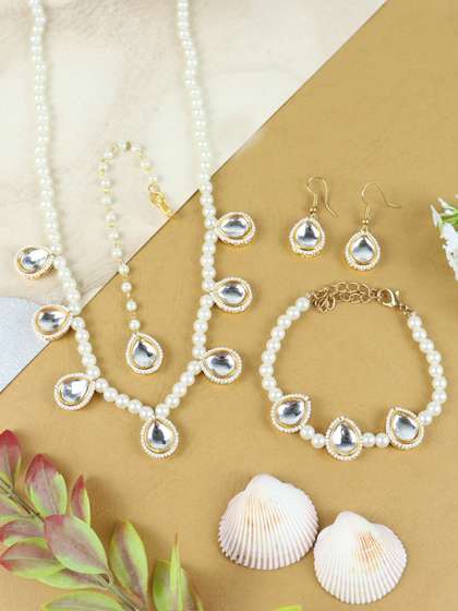 Asthetika Kids
                    Gold-Plated Kundan-Studded &Pearl Beaded
                    Jewellery Set