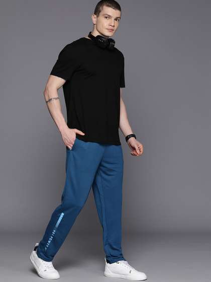 HRX by Hrithik
                          Roshan Men Solid Lifestyle Track Pants