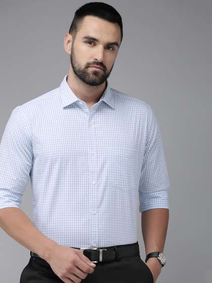 Park Avenue Pure
                        Cotton Self Design Slim Fit Textured Formal
                        Shirt