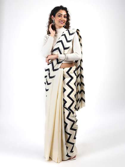 TEEJH Striped Pure
                        Cotton Saree