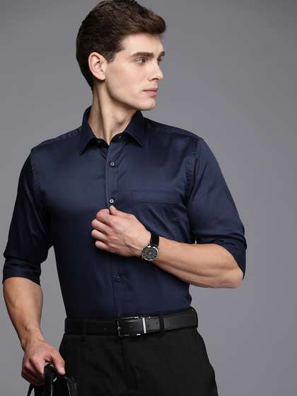 Raymond Pure Cotton
                        Solid Slim Fit Formal Shirt