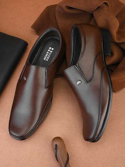 HERE&NOW Men
                        Brown Textured Formal Slip-On Shoes